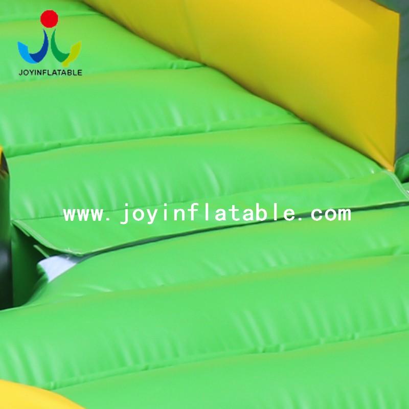 JOY inflatable Custom wipeout bounce house cost for outdoor playground
