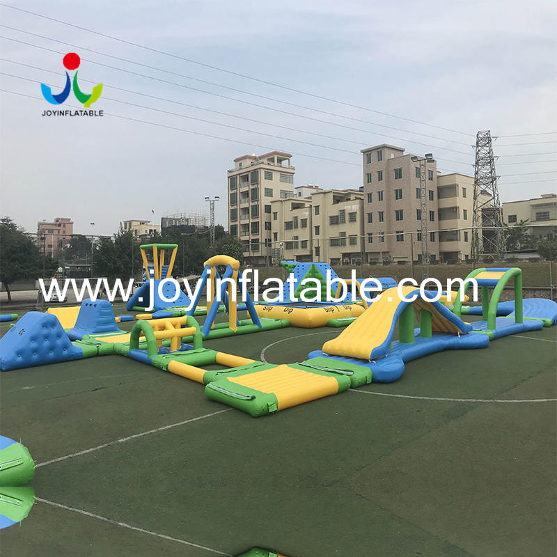 JOY inflatable sports floating playground with good price for child