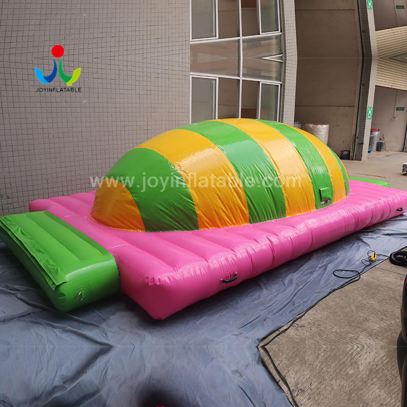 Inflatable Floating Water Park With Water jumping Air Bag Hill