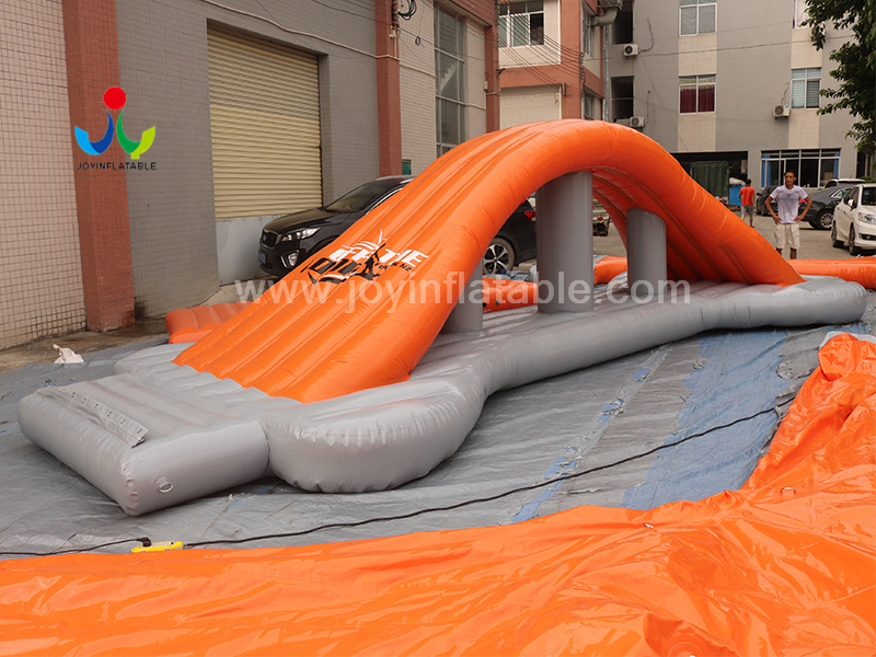Parc de jeux de Sport de Trampoline flottant de glissière d'eau gonflable énorme de fabricant pour la vidéo adulte