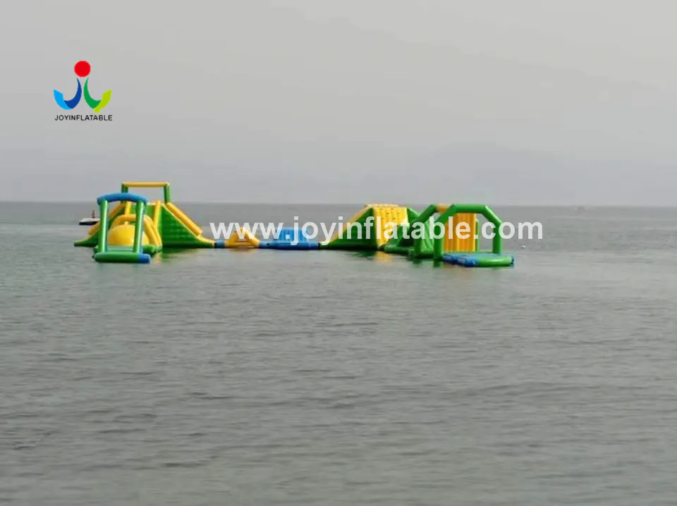 Joyinflatable The Biggest Inflatable Floating Water Sport Park With Jumping Platform For Adult Video