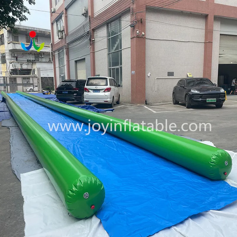 JOY Inflatable top water slides supplier for kids